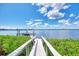 A private boat dock offers waterfront access and scenic views at 17509 Ohara Dr, Port Charlotte, FL 33948