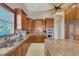 Gourmet kitchen features wood cabinets, stainless steel appliances, granite countertops, and lots of storage at 17509 Ohara Dr, Port Charlotte, FL 33948