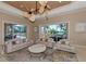 Expansive living room with ceiling fan, and water views at 17509 Ohara Dr, Port Charlotte, FL 33948