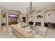 Cozy living room featuring a fireplace and stylish decor at 17509 Ohara Dr, Port Charlotte, FL 33948