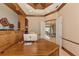 Office boasts custom wood shelving and a detailed ceiling design at 17509 Ohara Dr, Port Charlotte, FL 33948