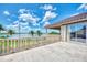 Wide patio with stone floors, a balustrade and views of the water and palm trees at 17509 Ohara Dr, Port Charlotte, FL 33948