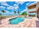 Waterfront pool and spa in backyard with covered patio at 17509 Ohara Dr, Port Charlotte, FL 33948