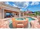 Backyard pool and spa with covered patio, and second story patio at 17509 Ohara Dr, Port Charlotte, FL 33948