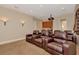 Spacious home theater featuring tiered seating, a projector, and snack bar at 17509 Ohara Dr, Port Charlotte, FL 33948