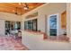 Covered patio featuring a wet bar and outdoor dining at 17509 Ohara Dr, Port Charlotte, FL 33948