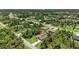 A charming home nestled among lush greenery in a quiet neighborhood at 1762 Mincey Ter, North Port, FL 34286