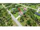 A cozy home with a screened-in pool and a neatly manicured lawn at 1762 Mincey Ter, North Port, FL 34286