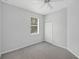 Carpeted bedroom with closet and window at 1762 Mincey Ter, North Port, FL 34286