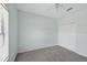 Bright bedroom with a ceiling fan, large window, and a spacious closet for ample storage at 1762 Mincey Ter, North Port, FL 34286