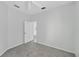 Clean, carpeted bedroom features an open door and ceiling fan at 1762 Mincey Ter, North Port, FL 34286