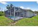 This is a screened-in pool offers a perfect blend of relaxation and outdoor enjoyment in a well-maintained backyard setting at 1762 Mincey Ter, North Port, FL 34286