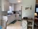Bright kitchen with white cabinets, ample counter space, and modern appliances at 18094 Ackerman Ave, Port Charlotte, FL 33948