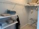 Walk-in Closet featuring tiled floors and ample shelving at 18094 Ackerman Ave, Port Charlotte, FL 33948