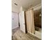 Functional bathroom with a shower-tub combo, neutral color scheme, and a clean, simple design at 1992 Sunset Preserve Way, Port Charlotte, FL 33953