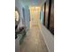 Inviting hallway with neutral color scheme and modern decor at 1992 Sunset Preserve Way, Port Charlotte, FL 33953