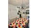 Bright eat-in kitchen featuring stainless steel appliances, white cabinets, and a large island at 1992 Sunset Preserve Way, Port Charlotte, FL 33953