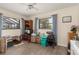 This bedroom has 2 large windows and hardwood floors at 2141 Rio De Janeiro Ave, Punta Gorda, FL 33983