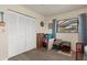 One bedroom has a large window and hardwood floors at 2141 Rio De Janeiro Ave, Punta Gorda, FL 33983