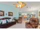 Inviting living room with an open floor plan that connects to the kitchen and dining areas, perfect for entertaining at 2141 Rio De Janeiro Ave, Punta Gorda, FL 33983