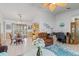 Open concept living room and dining area featuring lots of light and casual furnishings at 2141 Rio De Janeiro Ave, Punta Gorda, FL 33983