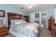This bedroom is spacious with hardwood flooring and en-suite access to the bathroom at 2141 Rio De Janeiro Ave, Punta Gorda, FL 33983