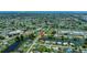 Aerial view of a residential neighborhood with waterfront access and the location of the listing marked with a red pin at 21539 Gladis Ave, Port Charlotte, FL 33952