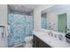 Bathroom featuring a vanity, mirror, toilet, and shower with patterned curtain at 21539 Gladis Ave, Port Charlotte, FL 33952