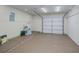 Spacious and clean two car garage with pull down attic access and room for storage at 21539 Gladis Ave, Port Charlotte, FL 33952