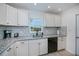Well-maintained kitchen with updated appliances and granite countertops at 21539 Gladis Ave, Port Charlotte, FL 33952