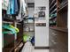 Walk-in closet featuring custom shelving and plenty of room for shoes and clothing at 2309 Conway Blvd, Port Charlotte, FL 33952