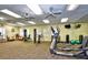 Bright and spacious gym featuring a variety of exercise machines, free weights, and ample space for workouts at 24132 Buckingham Way, Punta Gorda, FL 33980