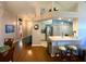 Cozy kitchen area featuring a breakfast bar and stainless steel appliances at 24132 Buckingham Way, Punta Gorda, FL 33980