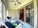 Relaxing lanai with comfortable seating, providing seamless access to both indoor and outdoor spaces at 24132 Buckingham Way, Punta Gorda, FL 33980