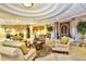 Inviting lobby featuring comfortable seating, decorative accents, and a stylish ambiance for residents and guests at 24132 Buckingham Way, Punta Gorda, FL 33980