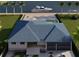 Stunning waterfront home featuring a private pool, boat dock, and beautifully landscaped yard at 24317 Treasure Island Blvd, Punta Gorda, FL 33955