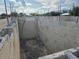 Long shot showing the side of a concrete block foundation ready for construction at 24317 Treasure Island Blvd, Punta Gorda, FL 33955