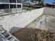 Image showcasing foundation construction of this waterfront property with block walls at 24317 Treasure Island Blvd, Punta Gorda, FL 33955