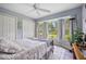Comfortable bedroom featuring ample natural light, neutral paint, and closet at 2455 Jacoby Cir, North Port, FL 34288