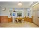 Bright breakfast nook featuring a table for two and a beautiful window view at 2455 Jacoby Cir, North Port, FL 34288