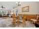 Cozy dining area featuring a round table, stylish chairs, and elegant lighting at 2455 Jacoby Cir, North Port, FL 34288