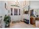 Welcoming home foyer featuring neutral tile flooring and decorative elements at 2455 Jacoby Cir, North Port, FL 34288