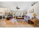 Inviting living room with ample natural light and a cozy sectional sofa at 2455 Jacoby Cir, North Port, FL 34288