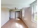 Primary bedroom with a ceiling fan and a large closet at 2513 Ambrose Ln, Port Charlotte, FL 33952