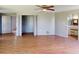 A spacious bedroom features a closet and an en-suite bathroom for convenience and privacy at 2513 Ambrose Ln, Port Charlotte, FL 33952