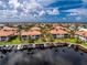 Aerial view of waterfront home with private dock and beautiful community at 2630 Tarpon Cove Dr # 211, Punta Gorda, FL 33950