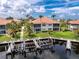 Waterfront home with private docks, lush landscaping and manicured lawn at 2630 Tarpon Cove Dr # 211, Punta Gorda, FL 33950