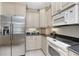 Bright kitchen with stainless steel appliances at 2630 Tarpon Cove Dr # 211, Punta Gorda, FL 33950