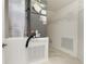 Utility room with an HVAC system and wire shelving for storage at 2630 Tarpon Cove Dr # 211, Punta Gorda, FL 33950