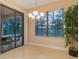 Dining room with tile floors and a view of the pool at 2712 Arugula Dr, North Port, FL 34289